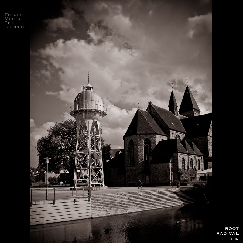 future-church Futuristic tower in front of a church. Black and white photo taken in Gronau.